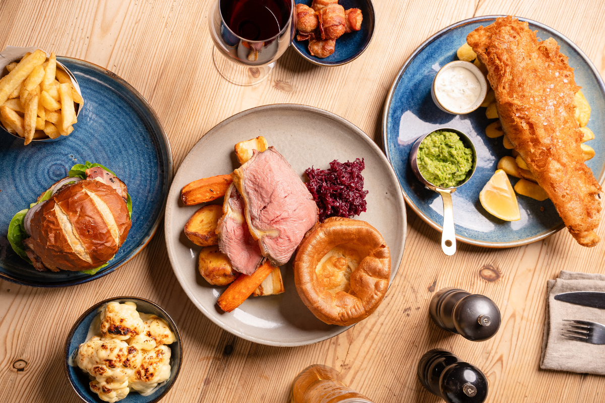 Family enjoy Father's Day roast dinner at the Bunk Inn in Curridge, Newbury